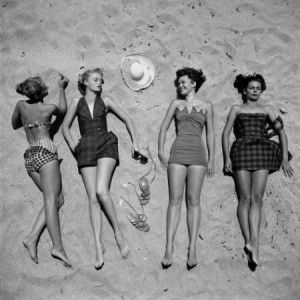 nina-leen-four-models-showing-off-the-latest-bathing-suit-fashions-while-lying-on-a-sandy-florida-beach_i-G-37-3795-SJIIF00Z-e1340564344146